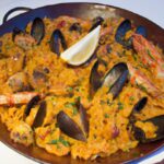 Paella Unveiled: Spain’s Iconic Dish of Flavor and Tradition
